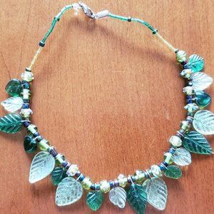 Handmade glass and bead necklace with a leaf motif
